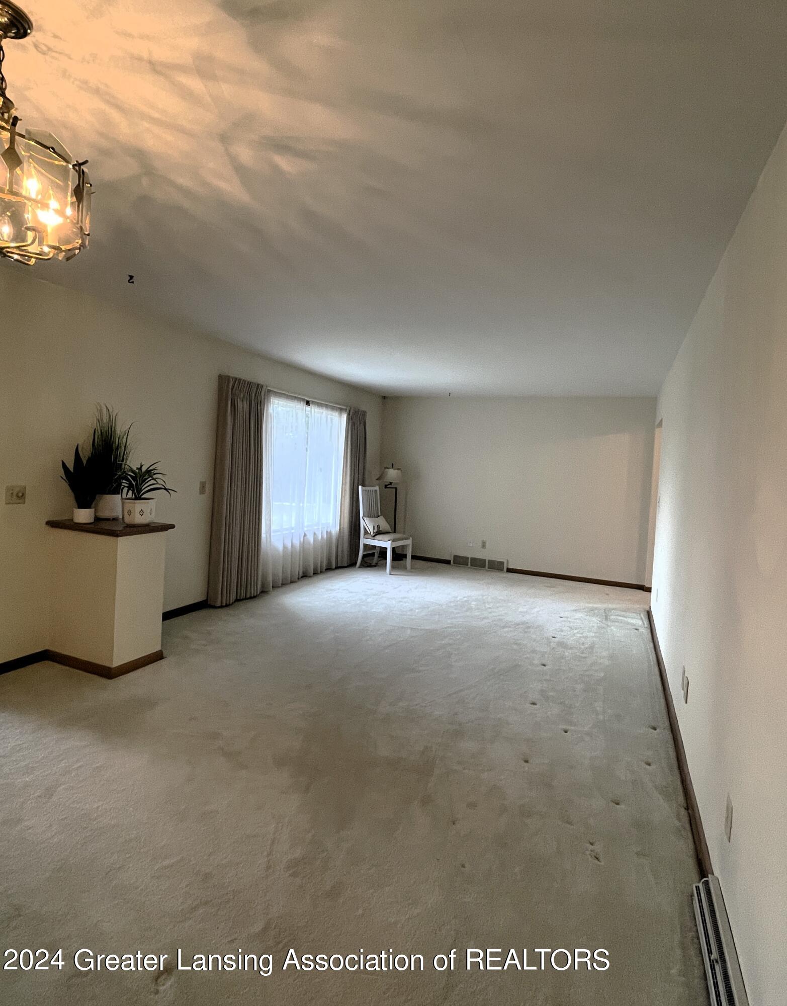 1730 Blue Grass Road Lansing, MI 48906 - Photo 5 of 26 formal dining & living