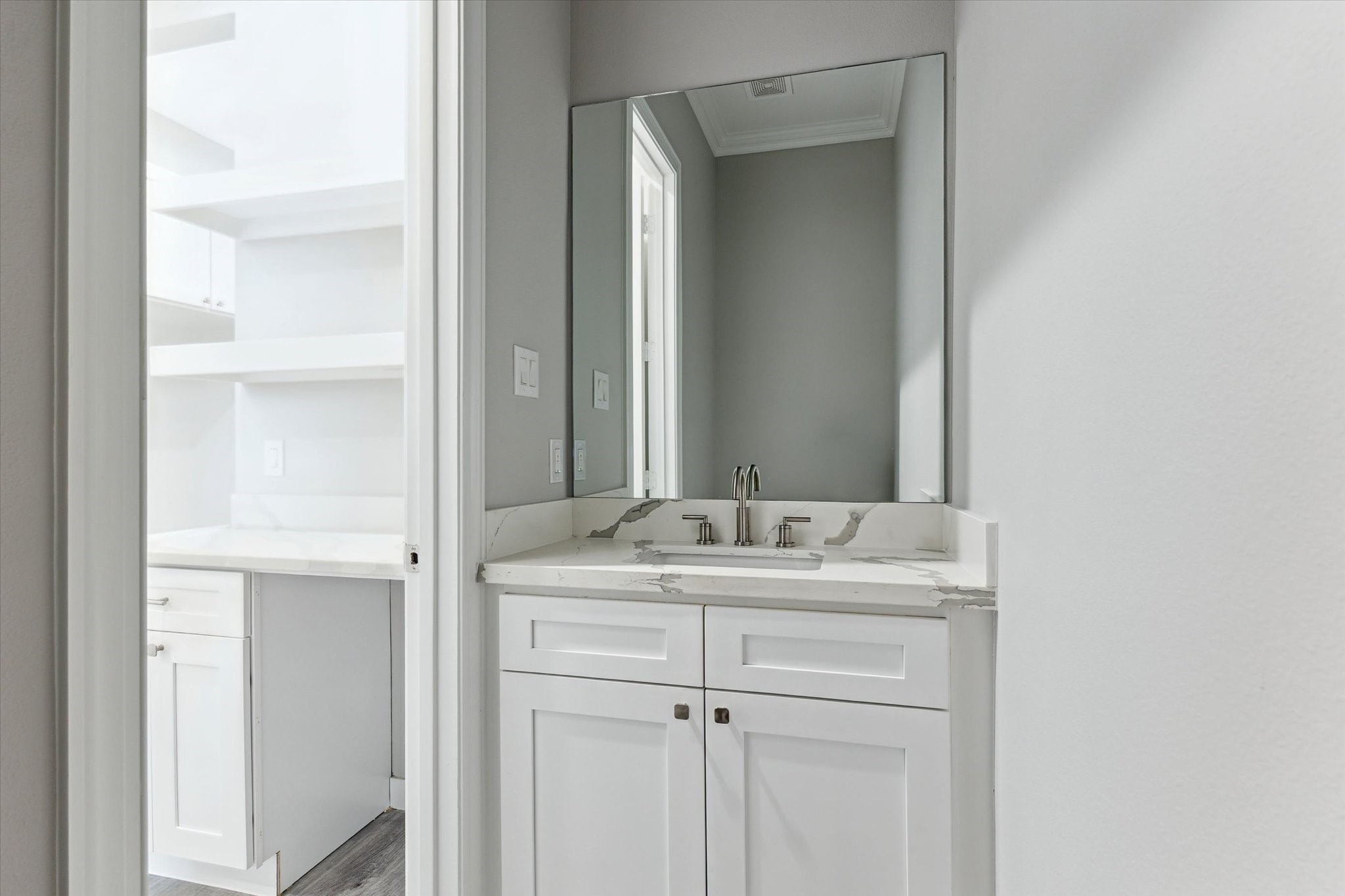 14 Fleming Hitchcock, TX 77563 - Photo 19 of 50 a bathroom with a sink and a mirror