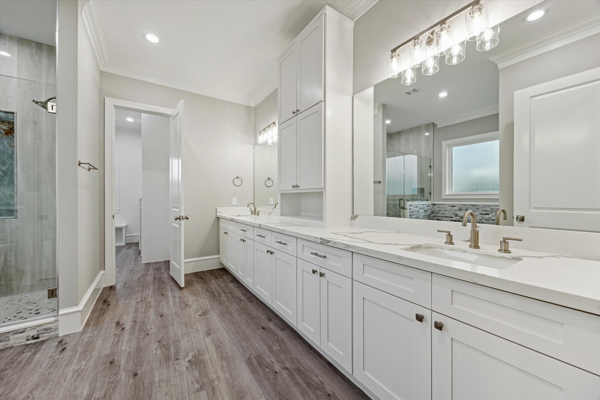 14 Fleming Hitchcock, TX 77563 - Photo 22 of 50 a spacious bathroom with a double vanity sink and a mirror