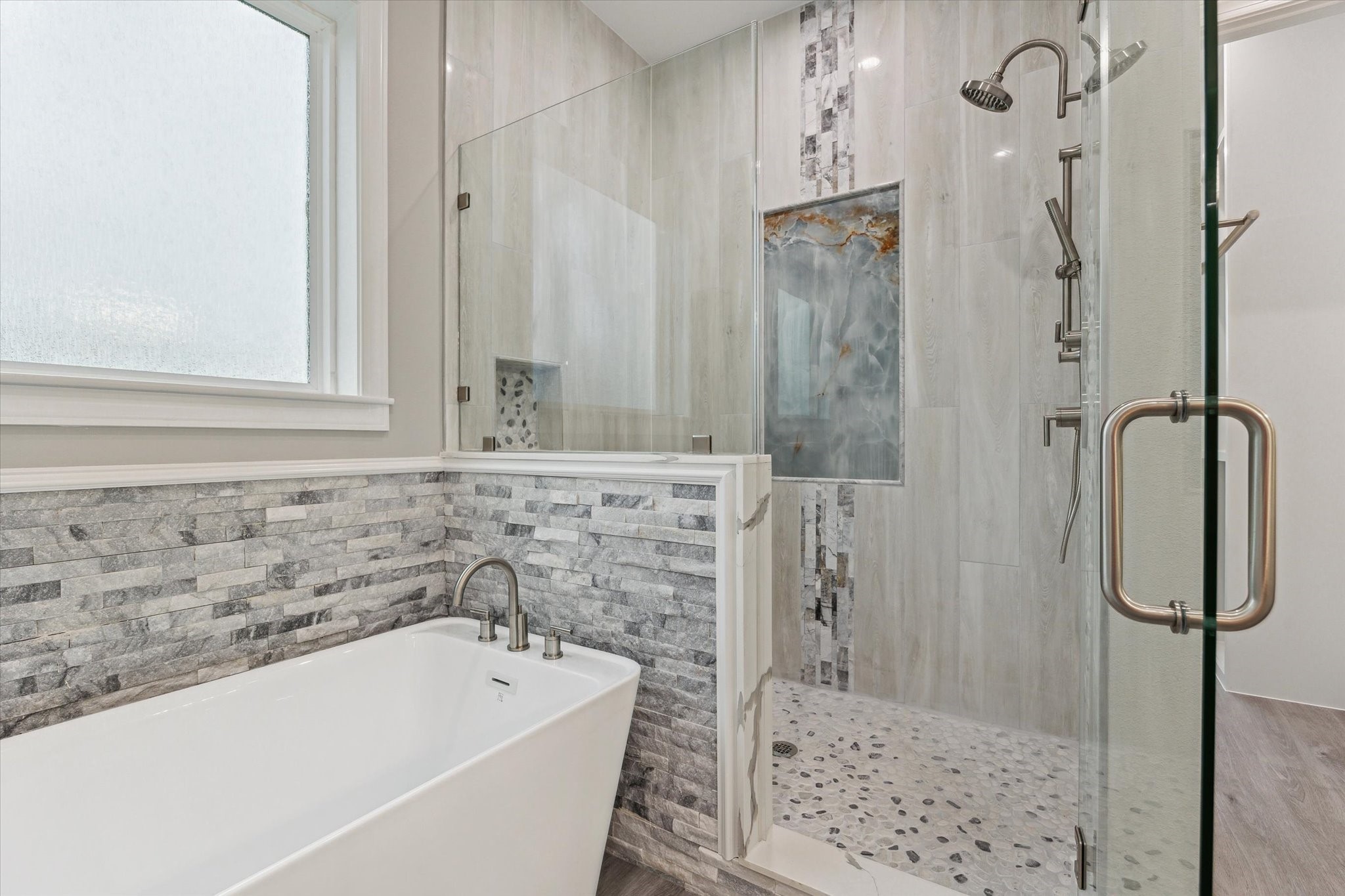 14 Fleming Hitchcock, TX 77563 - Photo 25 of 50 a bathroom with a bathtub and shower
