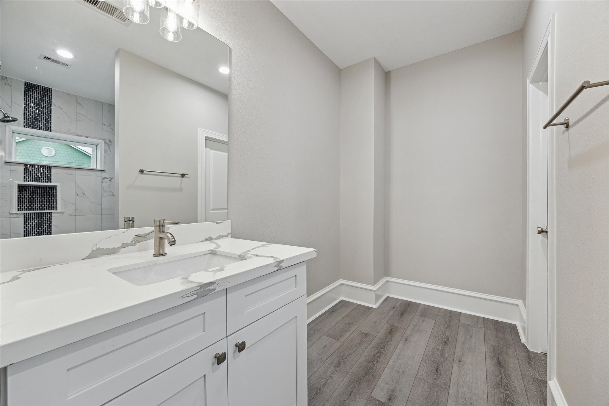 14 Fleming Hitchcock, TX 77563 - Photo 43 of 50 a bathroom with a sink mirror and vanity
