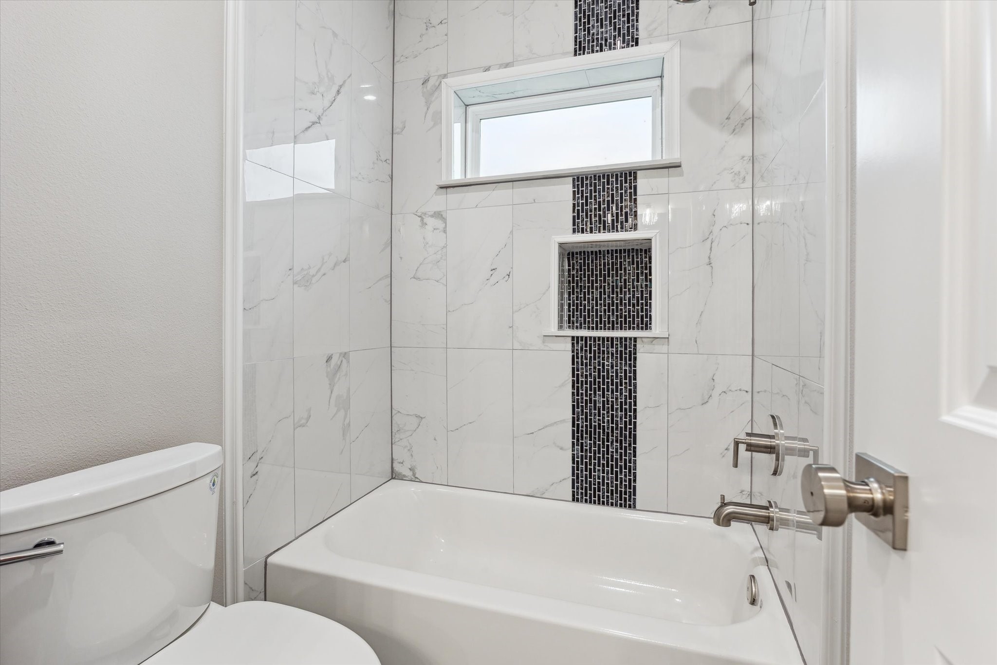 14 Fleming Hitchcock, TX 77563 - Photo 45 of 50 a bathroom with a bathtub and a shower