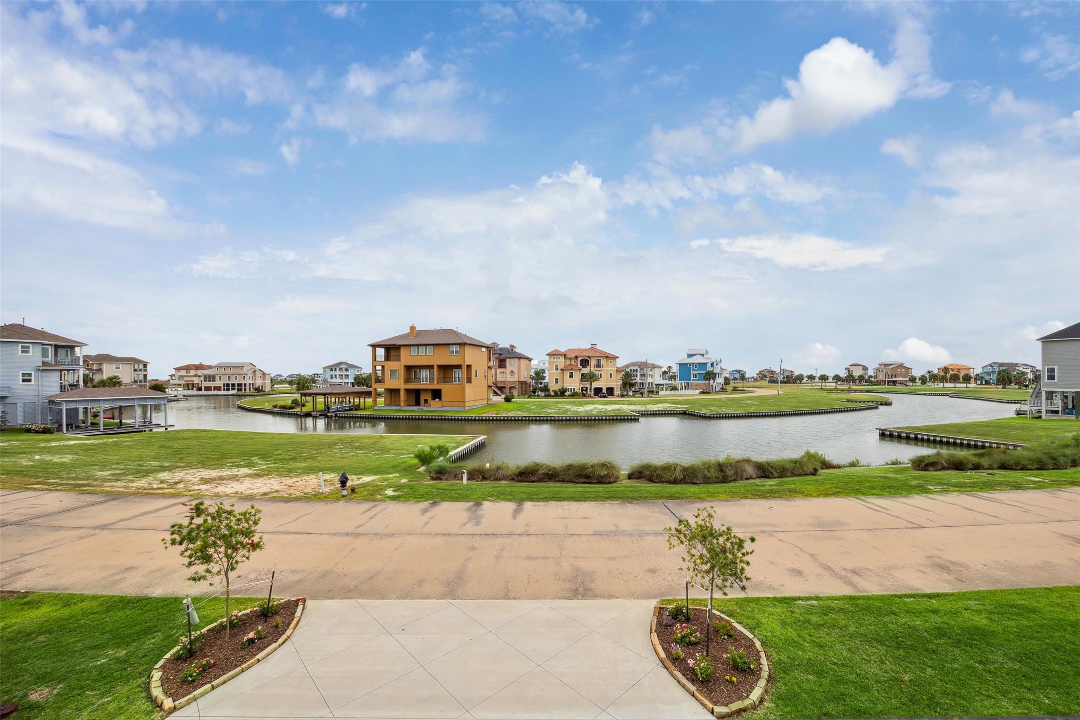 14 Fleming Hitchcock, TX 77563 - Photo 49 of 50 a view of a lake with houses in the back