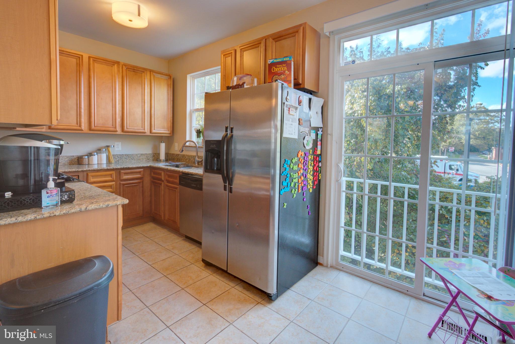6816 Annapolis Road Hyattsville, MD 20784 - Photo 15 of 37 eat-in kit, doors for future deck
