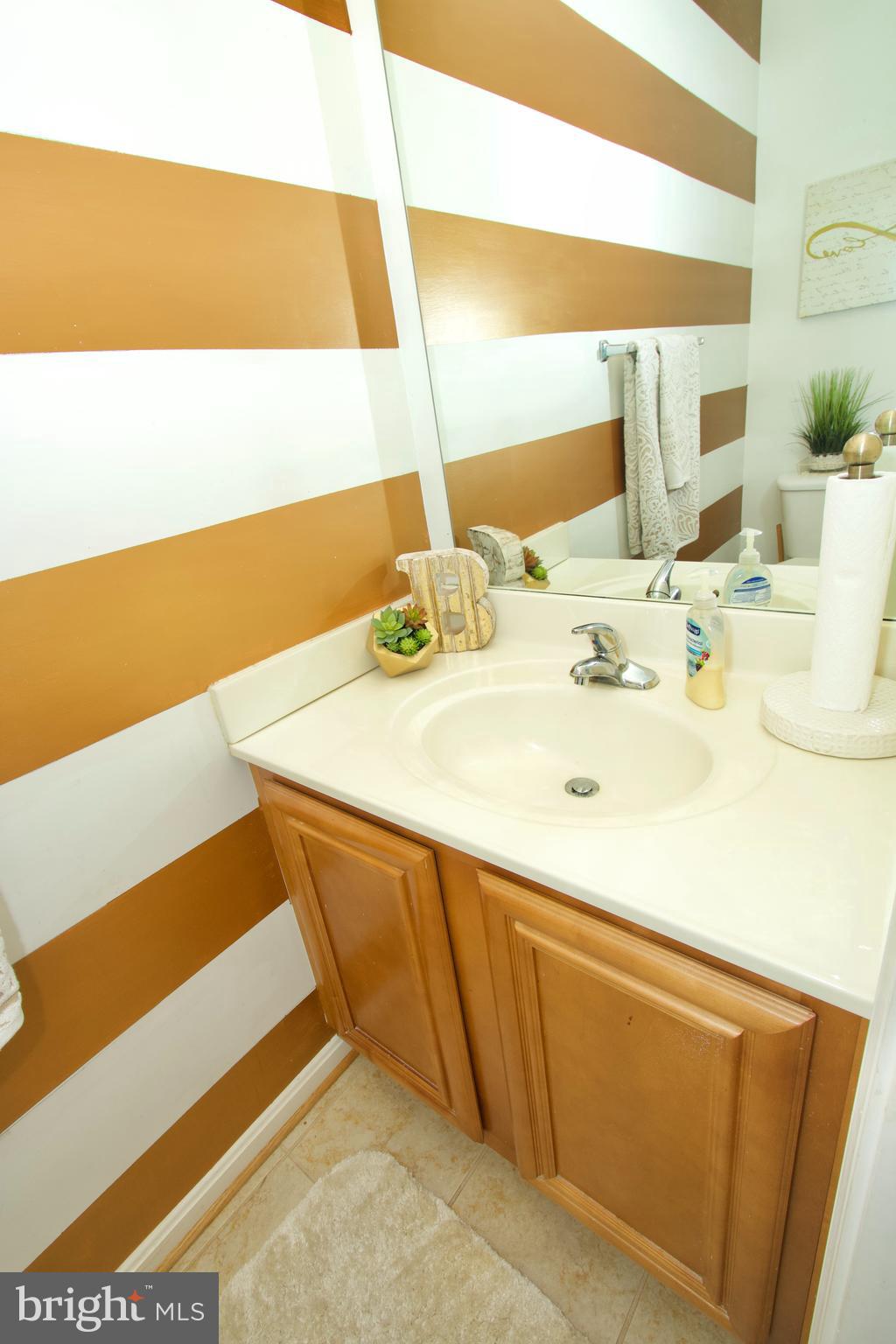 6816 Annapolis Road Hyattsville, MD 20784 - Photo 21 of 37 2nd floor half bath
