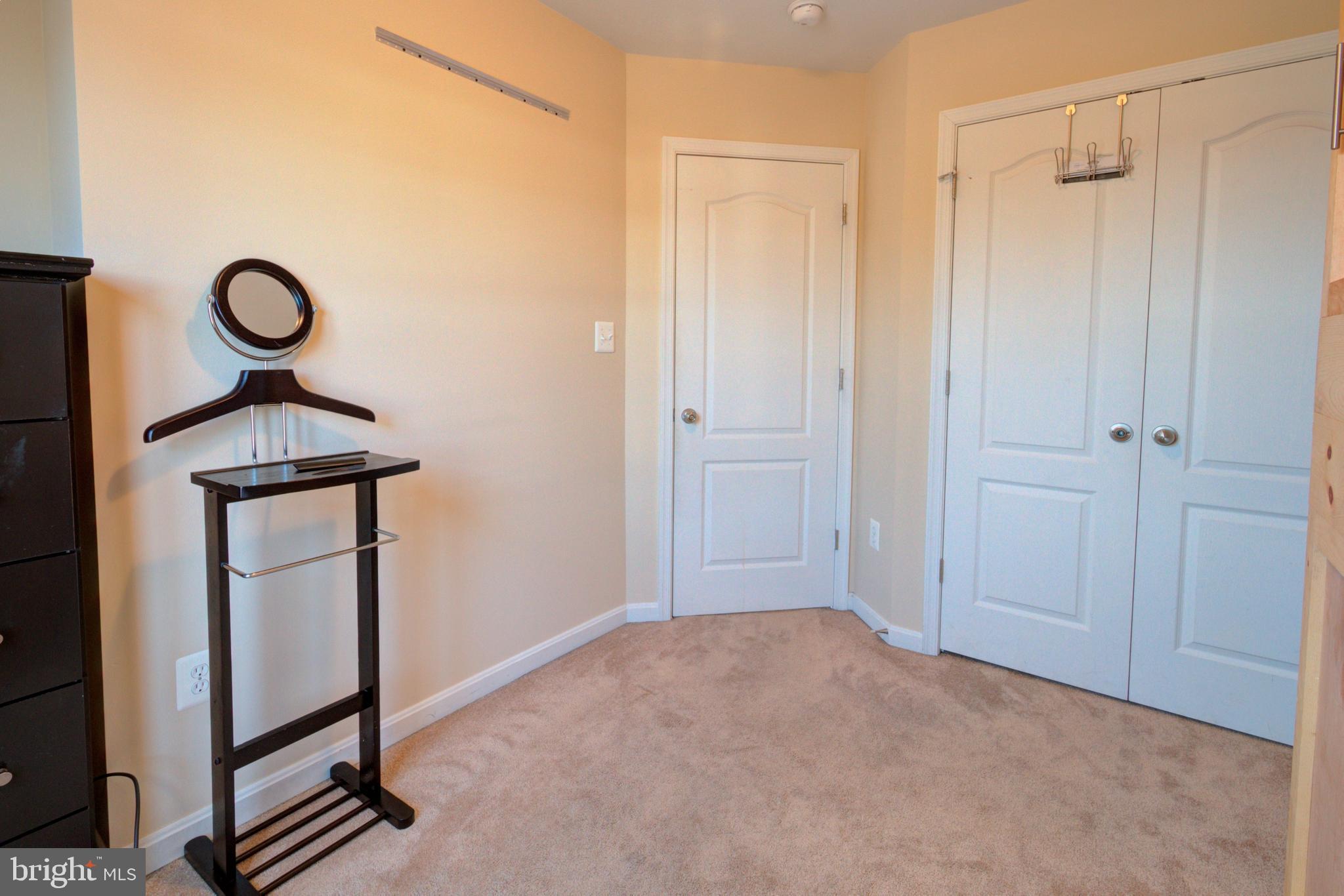 6816 Annapolis Road Hyattsville, MD 20784 - Photo 30 of 37 BR 3 looking at entry door and closet doors