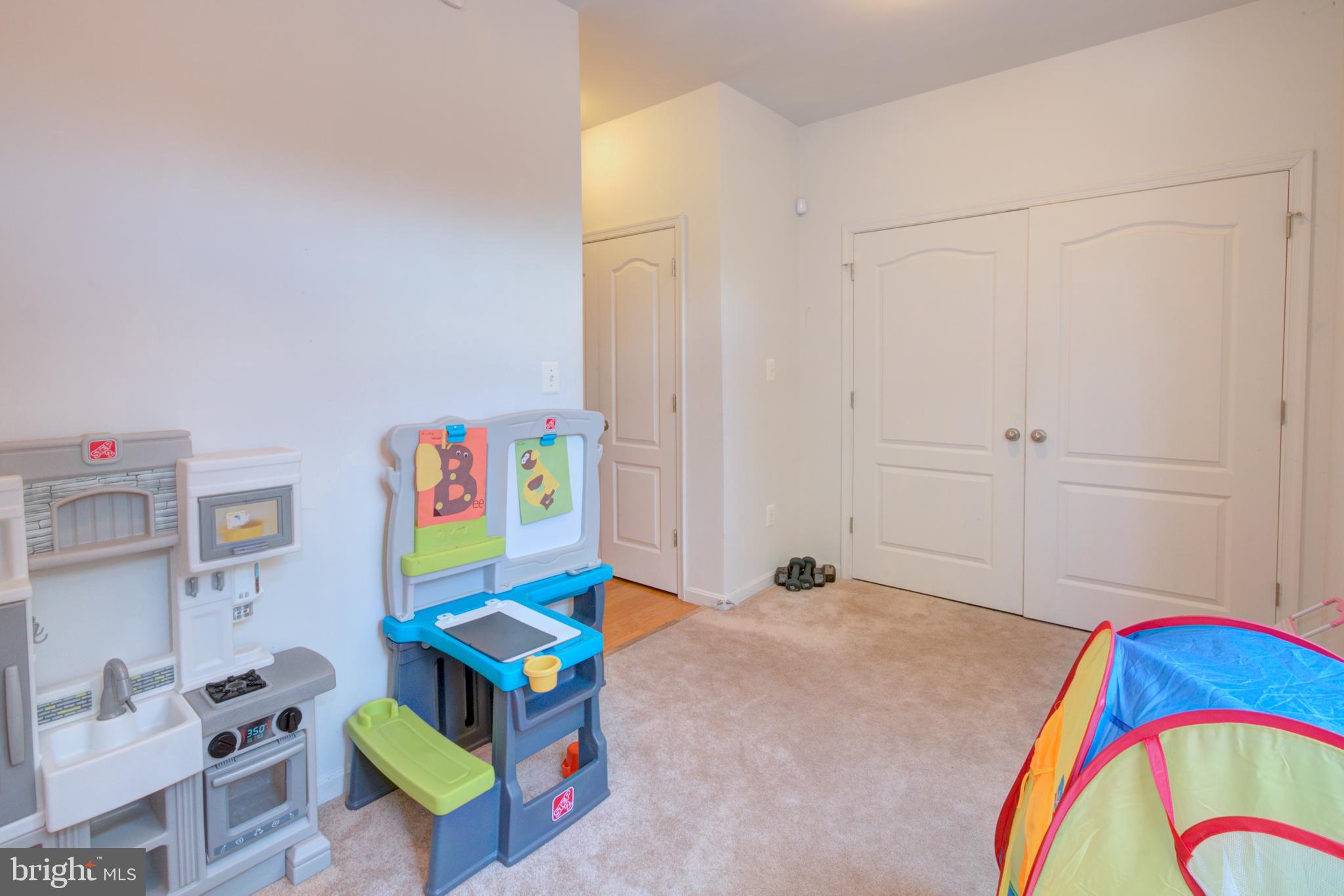 6816 Annapolis Road Hyattsville, MD 20784 - Photo 7 of 37 Recroom Area (Laundry behind those double doors