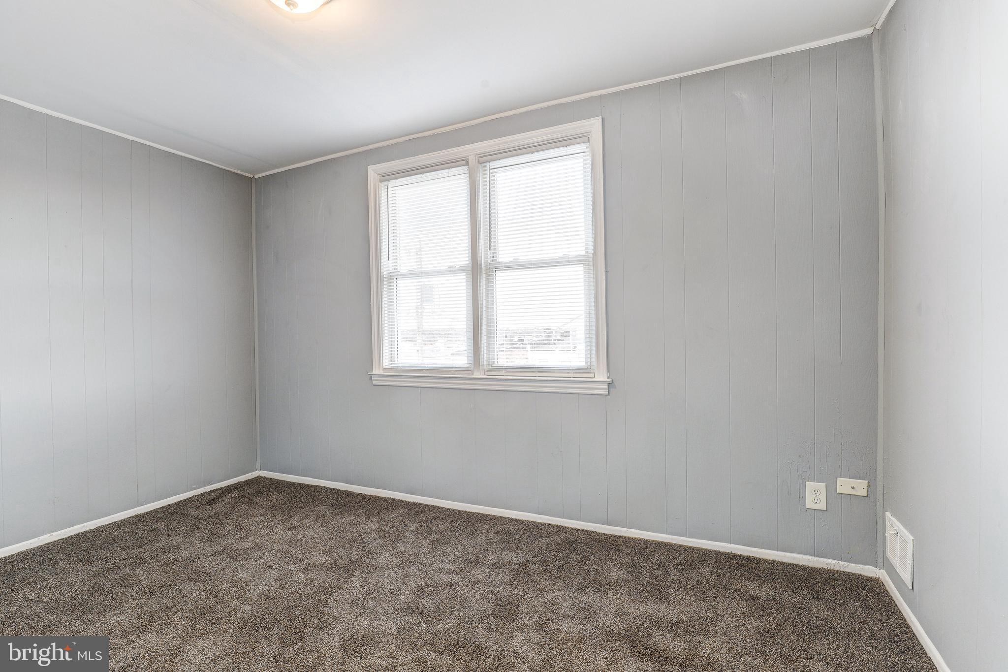 1913 Harman Avenue Baltimore, MD 21230 - Photo 16 of 41 an empty room with a window