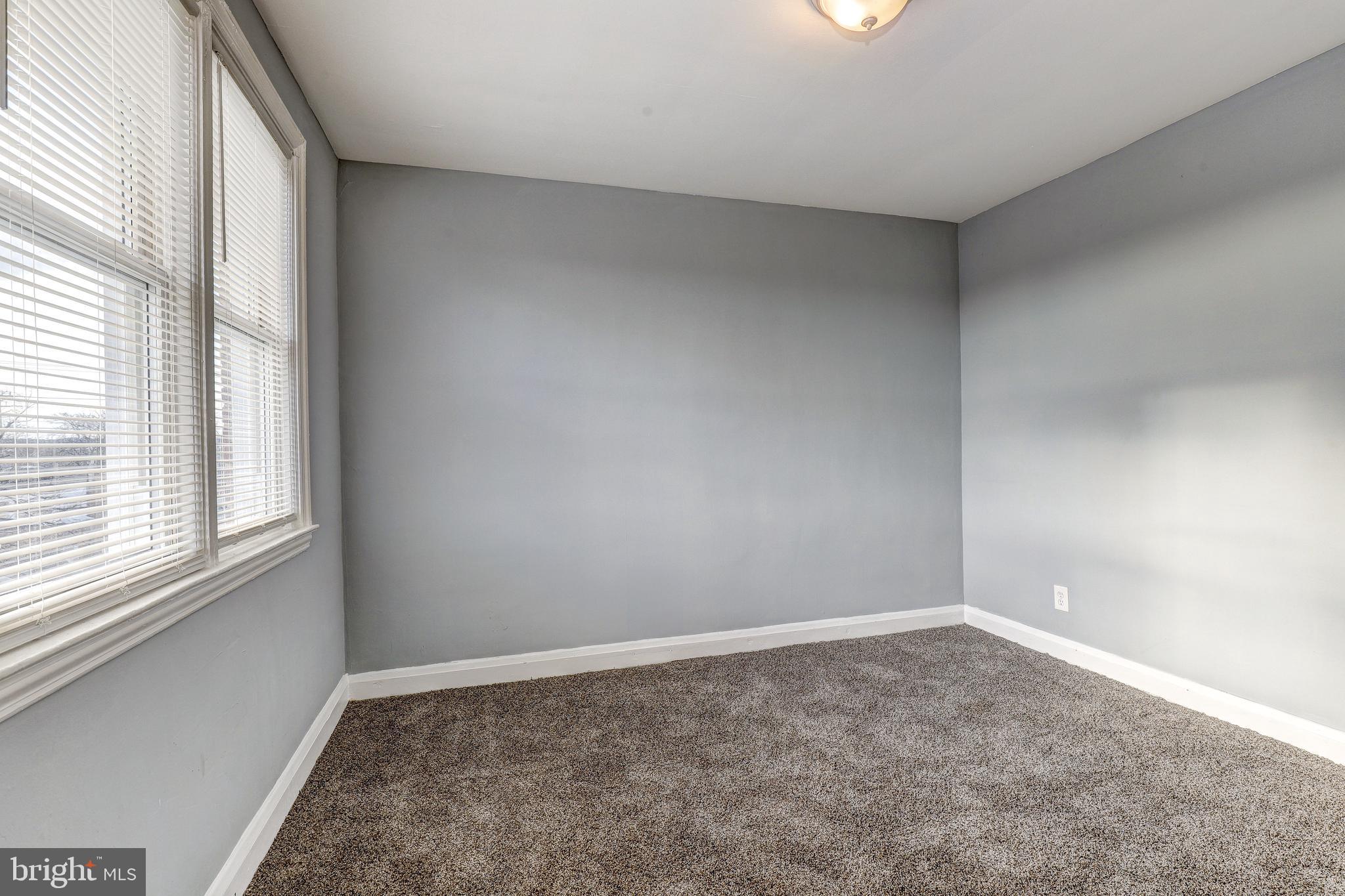 1913 Harman Avenue Baltimore, MD 21230 - Photo 17 of 41 an empty room with a window