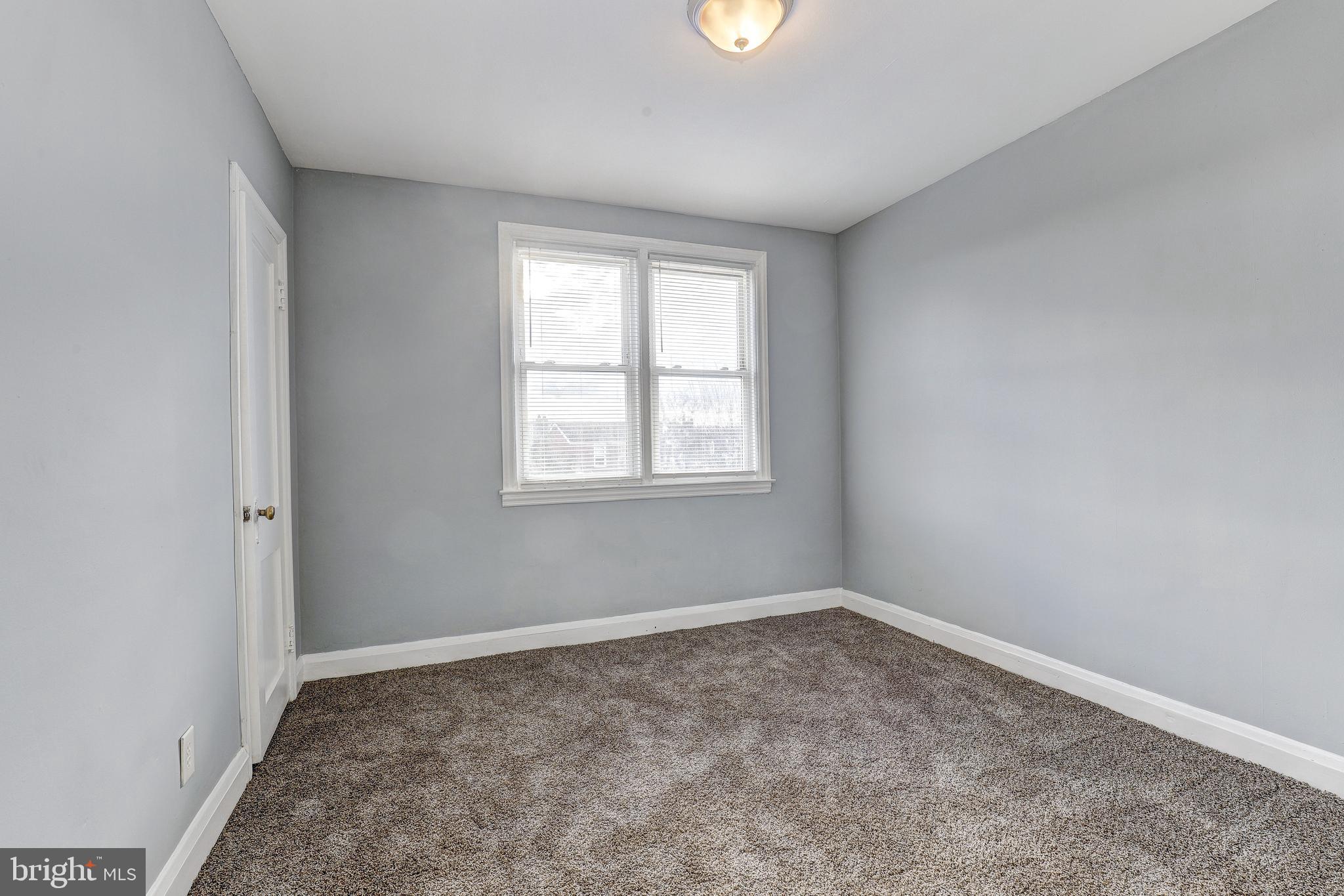 1913 Harman Avenue Baltimore, MD 21230 - Photo 21 of 41 an empty room with a window
