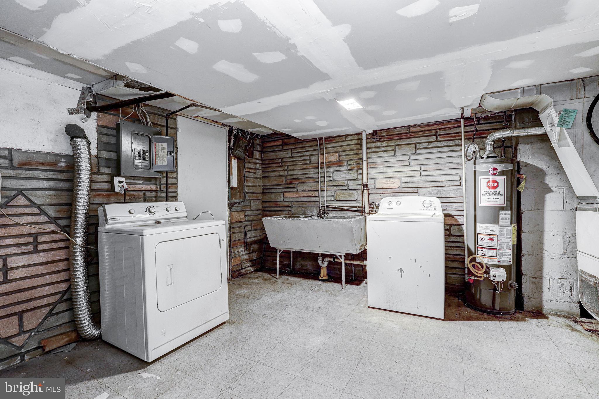 1913 Harman Avenue Baltimore, MD 21230 - Photo 28 of 41 a utility room with dryer and washer