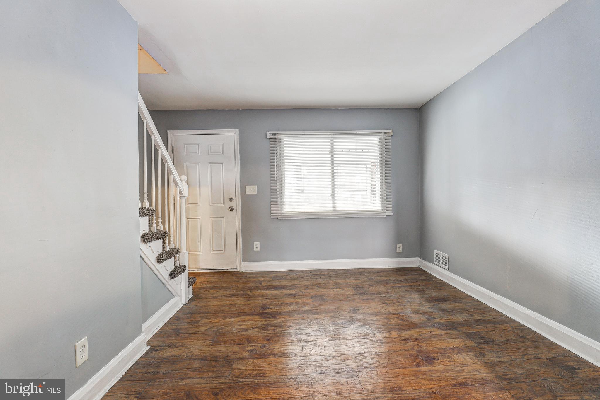 1913 Harman Avenue Baltimore, MD 21230 - Photo 7 of 41 a view of an empty room with a window