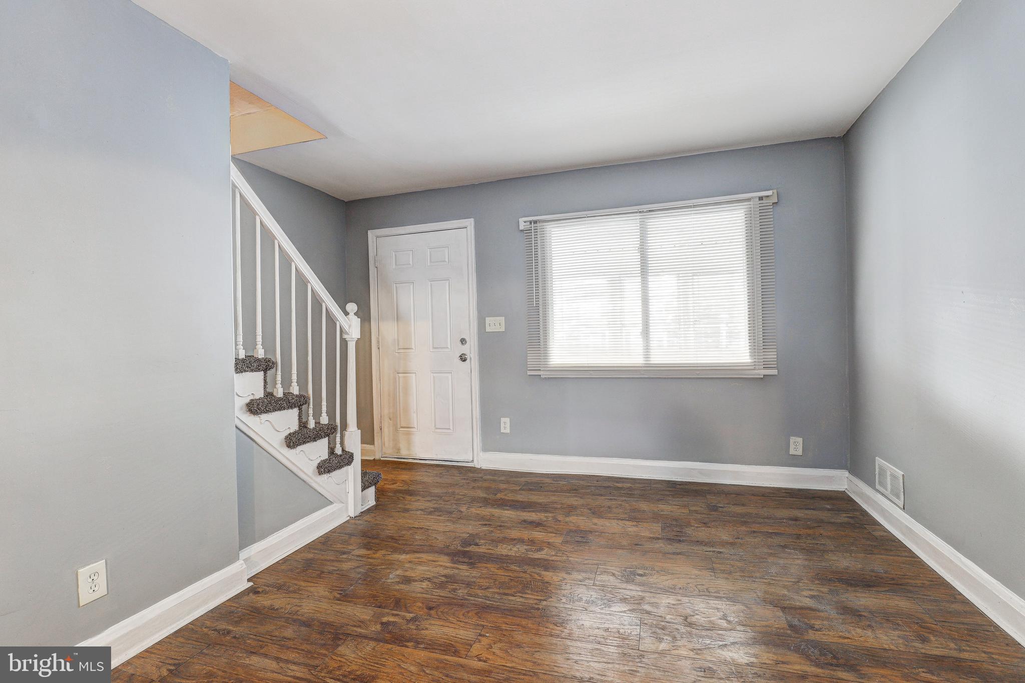 1913 Harman Avenue Baltimore, MD 21230 - Photo 8 of 41 a view of an empty room with a window