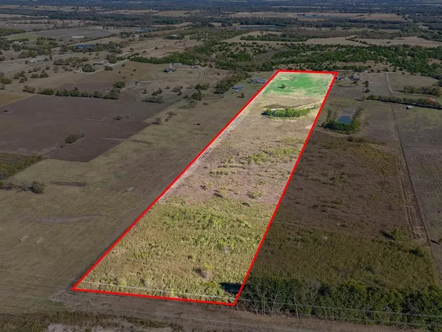 a view of swimming pool with a yard