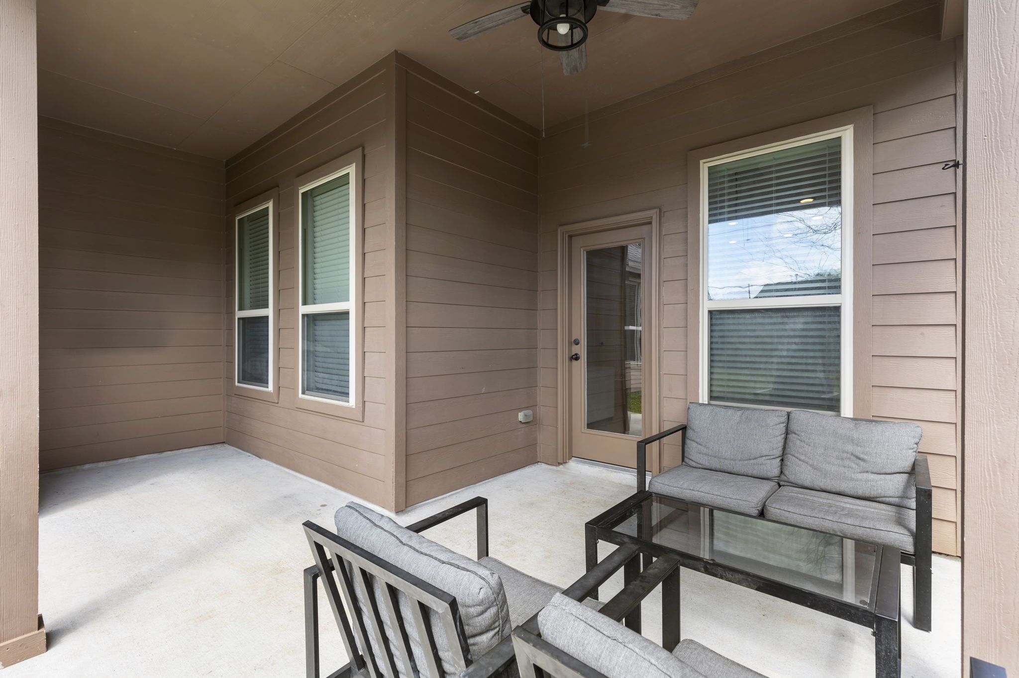 71 Sagamore Ridge Place The Woodlands, TX 77389 - Photo 32 of 34 a balcony with furniture and window