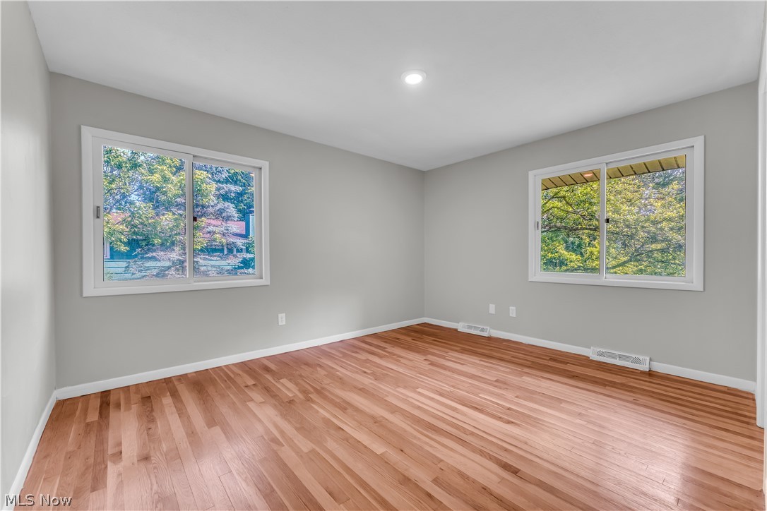 6190 Mill Road Broadview Heights, OH 44147 - Photo 24 of 36 Spare room featuring plenty of natural light and light wood-type flooring