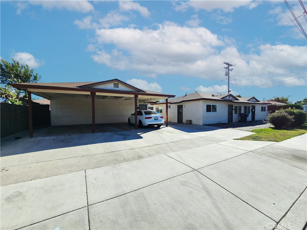 2544 Maxson Road El Monte, CA 91732 - Photo 1 of 6 a front view of a house with a yard and garage