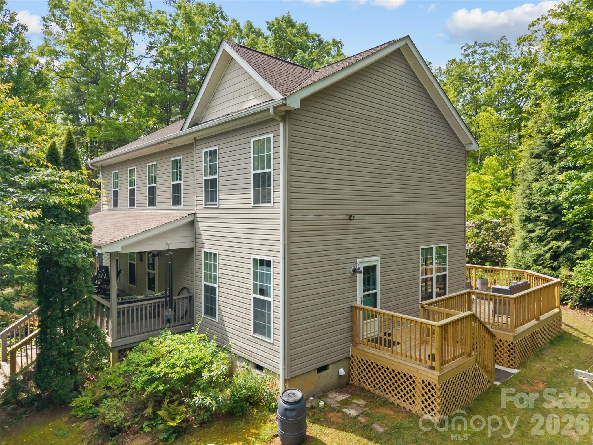 103 Old Southside Road Saluda, NC 28773 - Photo 4 of 48 front view of a house with a yard
