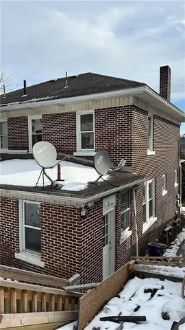 a front view of a house with entertaining space