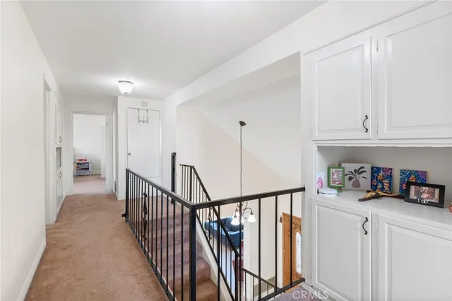 a view of a hallway with closet