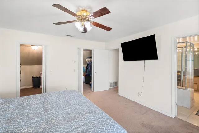 a view of a livingroom with a flat screen tv