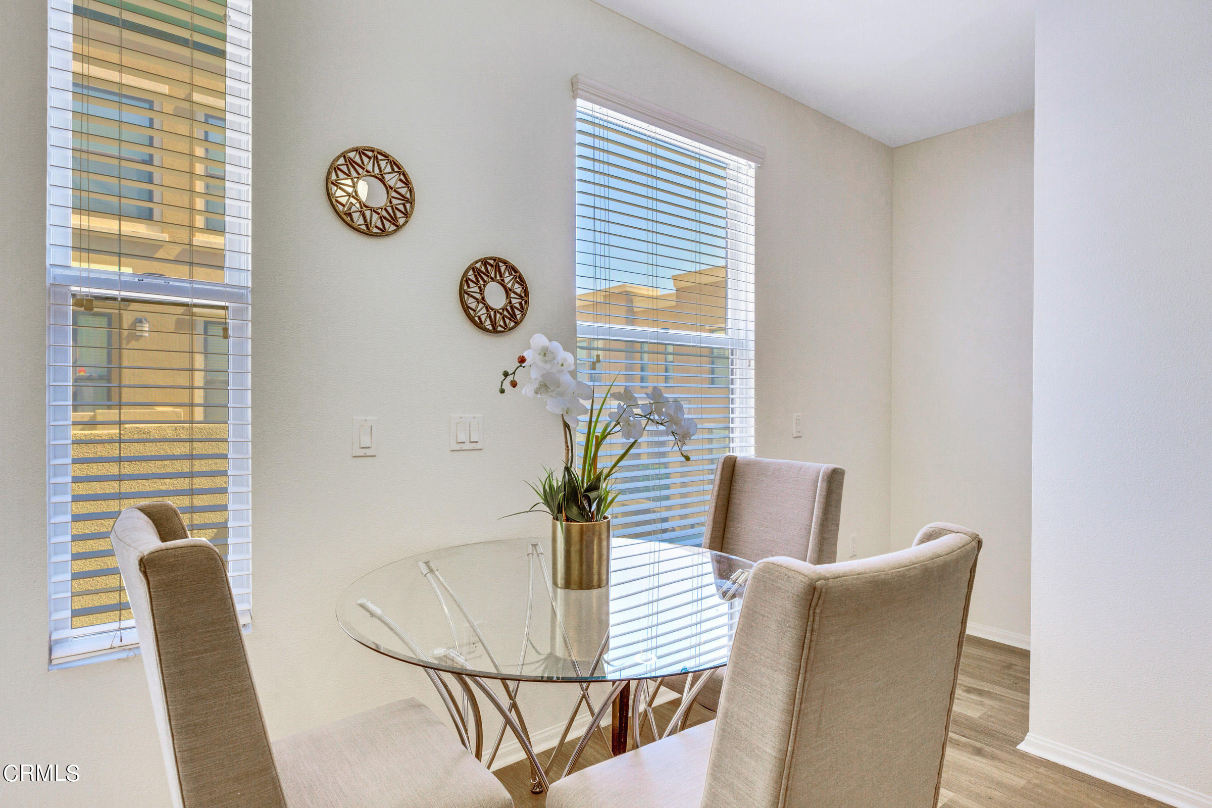410 West Main Street, Unit 231 Alhambra, CA 91801 - Photo 16 of 45 a view of a dining room with furniture and wooden floor