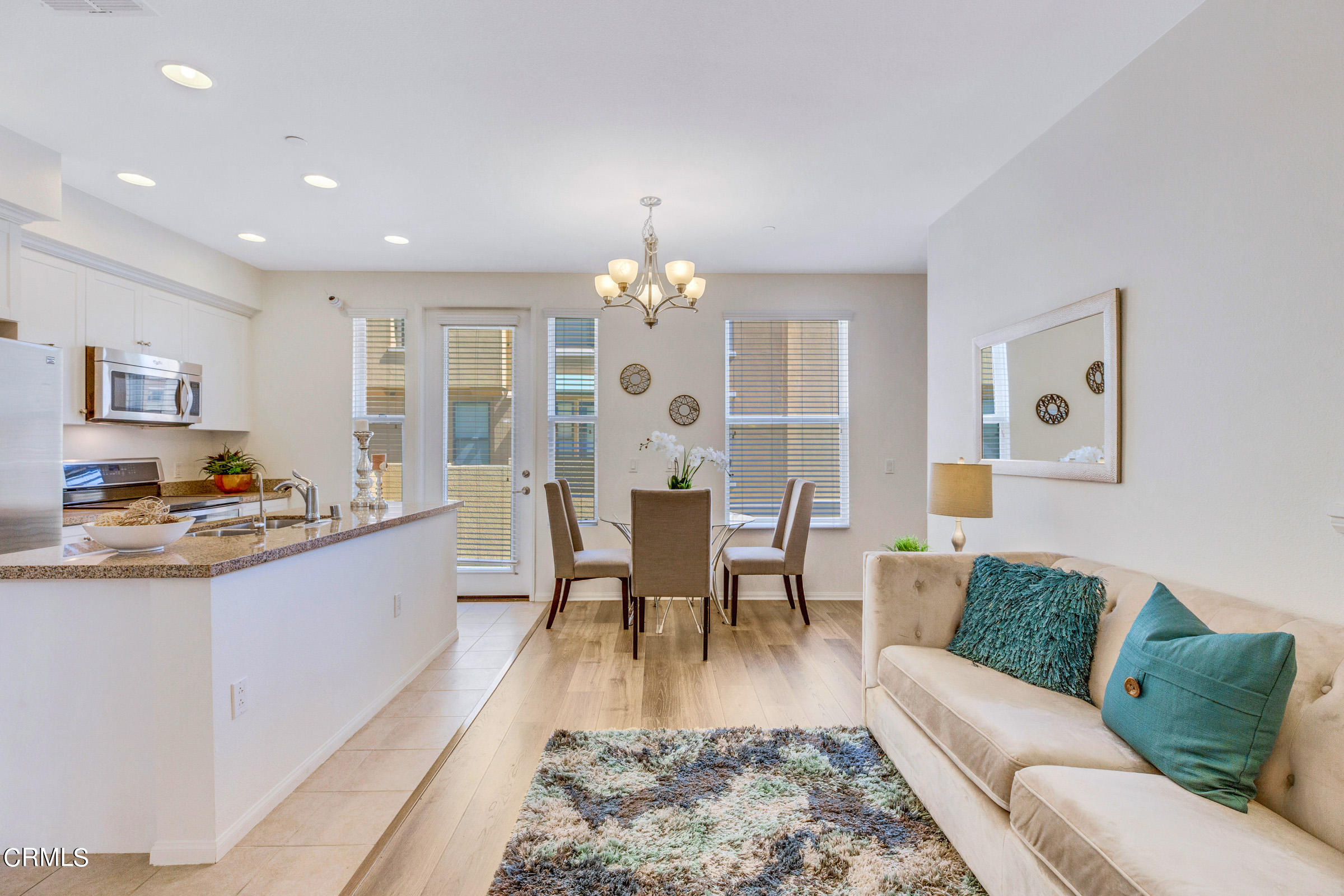 410 West Main Street, Unit 231 Alhambra, CA 91801 - Photo 18 of 45 a living room with furniture and a chandelier