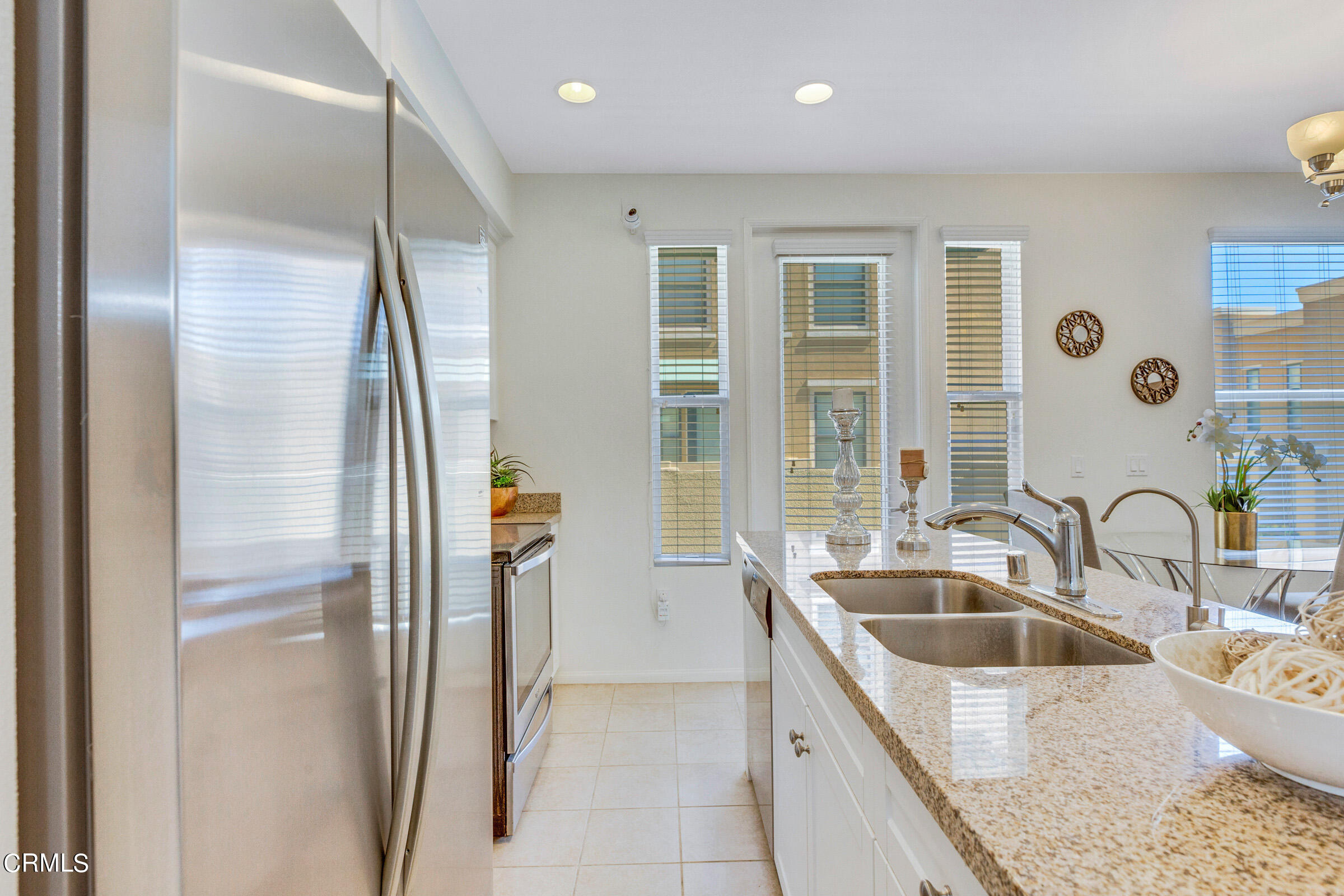 410 West Main Street, Unit 231 Alhambra, CA 91801 - Photo 20 of 45 a kitchen with stainless steel appliances granite countertop a refrigerator and a sink