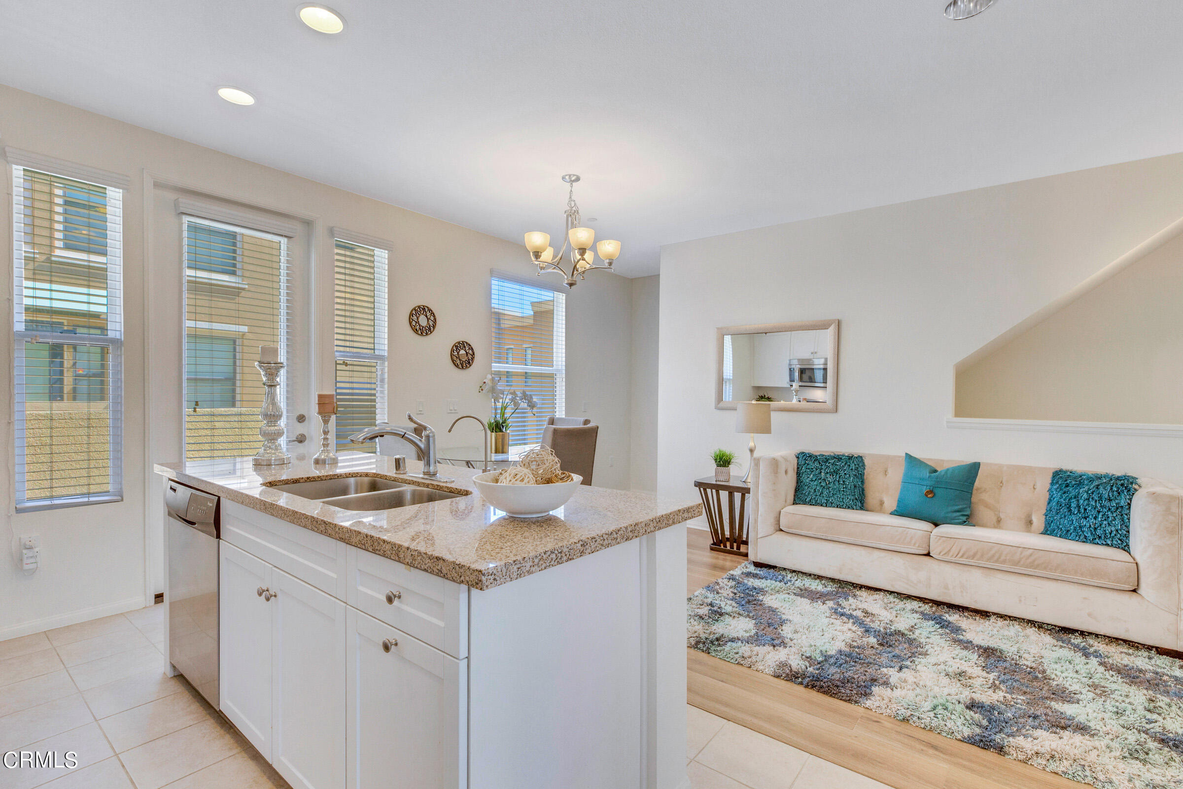 410 West Main Street, Unit 231 Alhambra, CA 91801 - Photo 21 of 45 a living room with furniture and a table