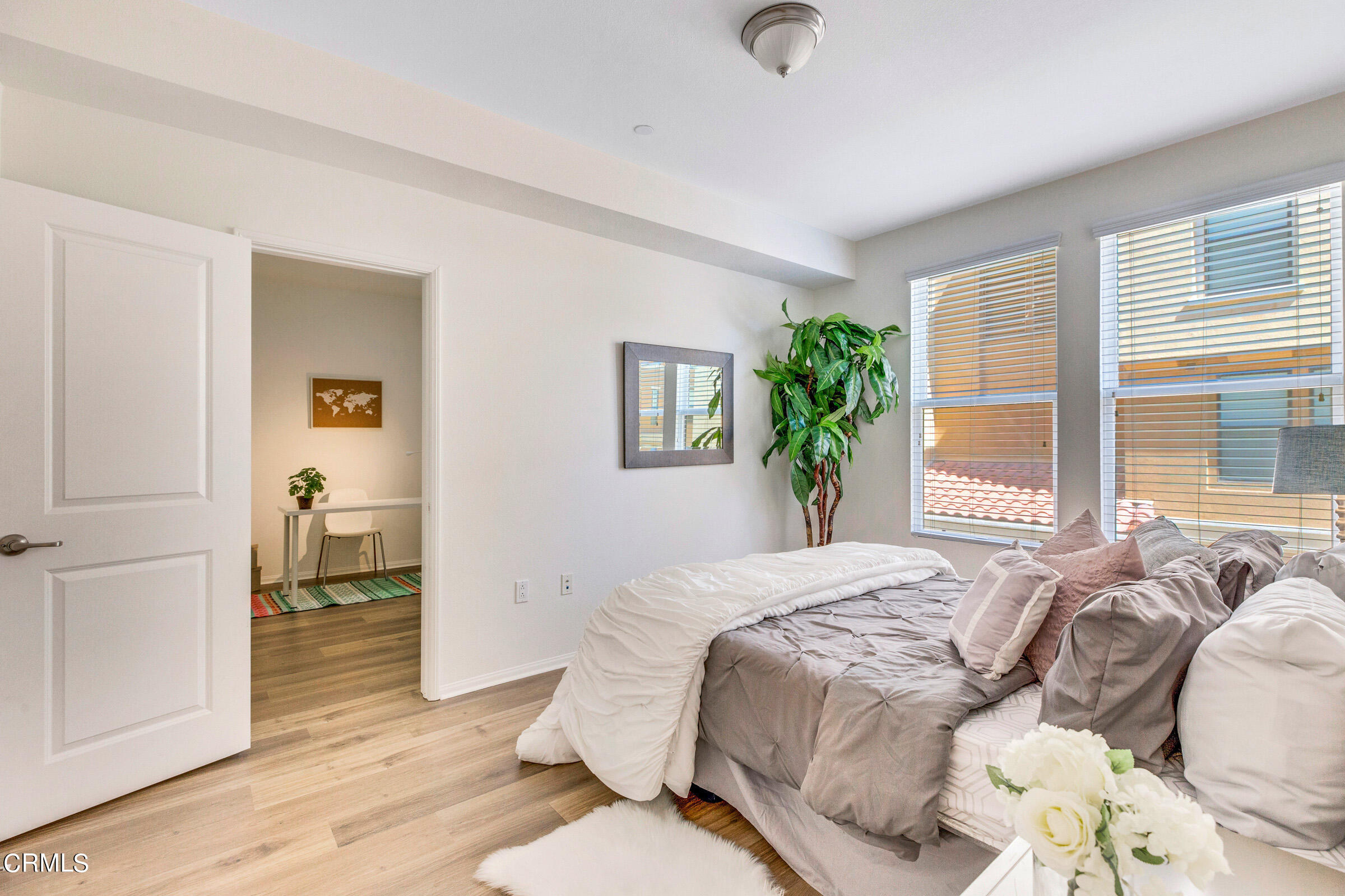 410 West Main Street, Unit 231 Alhambra, CA 91801 - Photo 25 of 45 a bedroom with a bed and a window