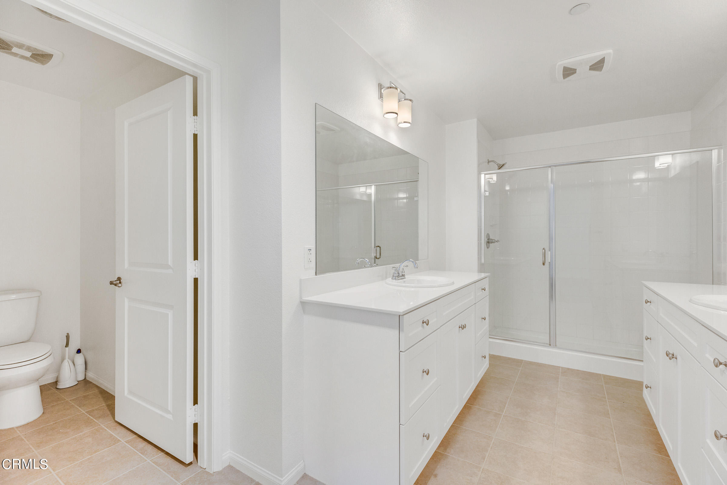 410 West Main Street, Unit 231 Alhambra, CA 91801 - Photo 40 of 45 a bathroom with a double vanity sink toilet and shower