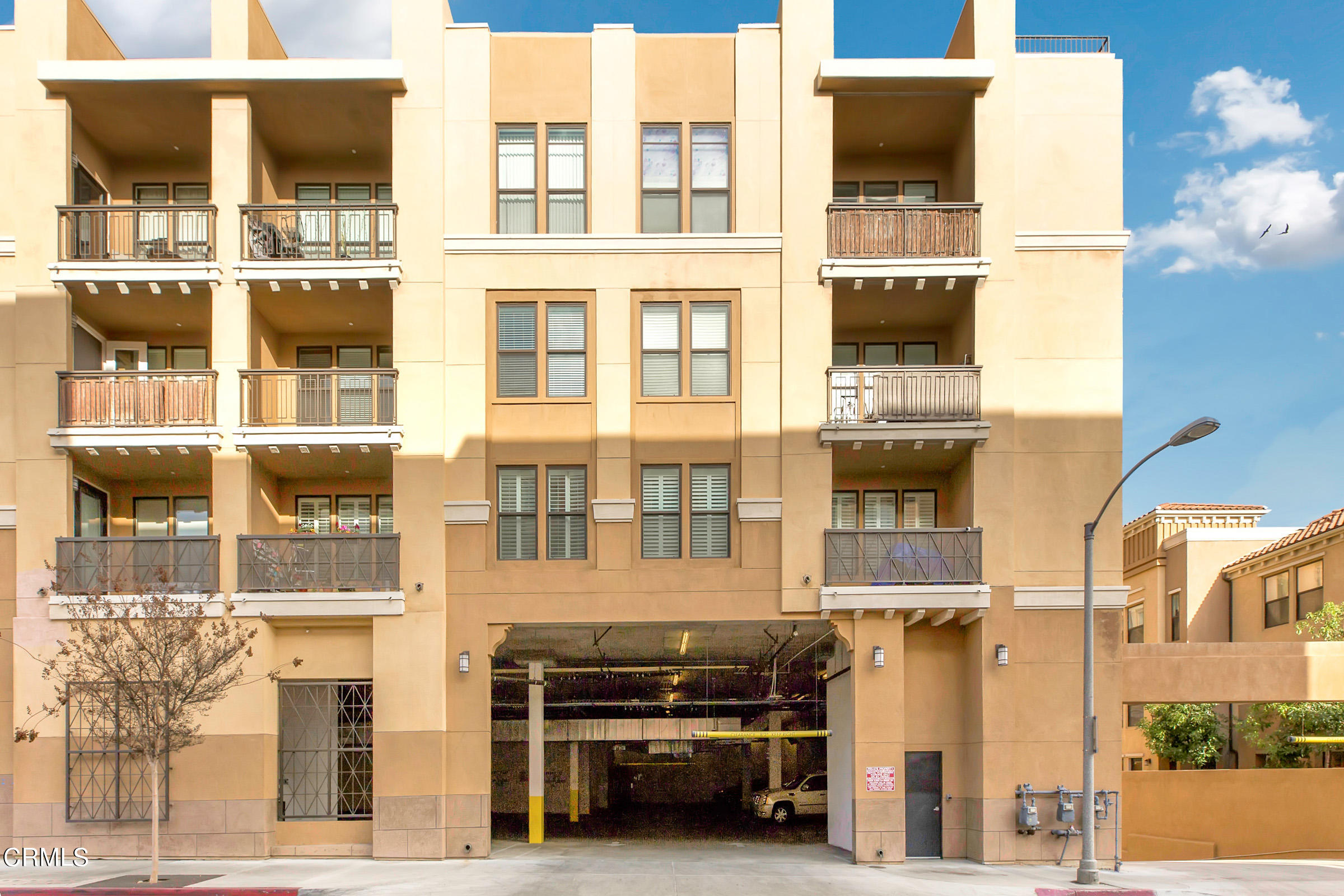 410 West Main Street, Unit 231 Alhambra, CA 91801 - Photo 45 of 45 a car parked in front of a building