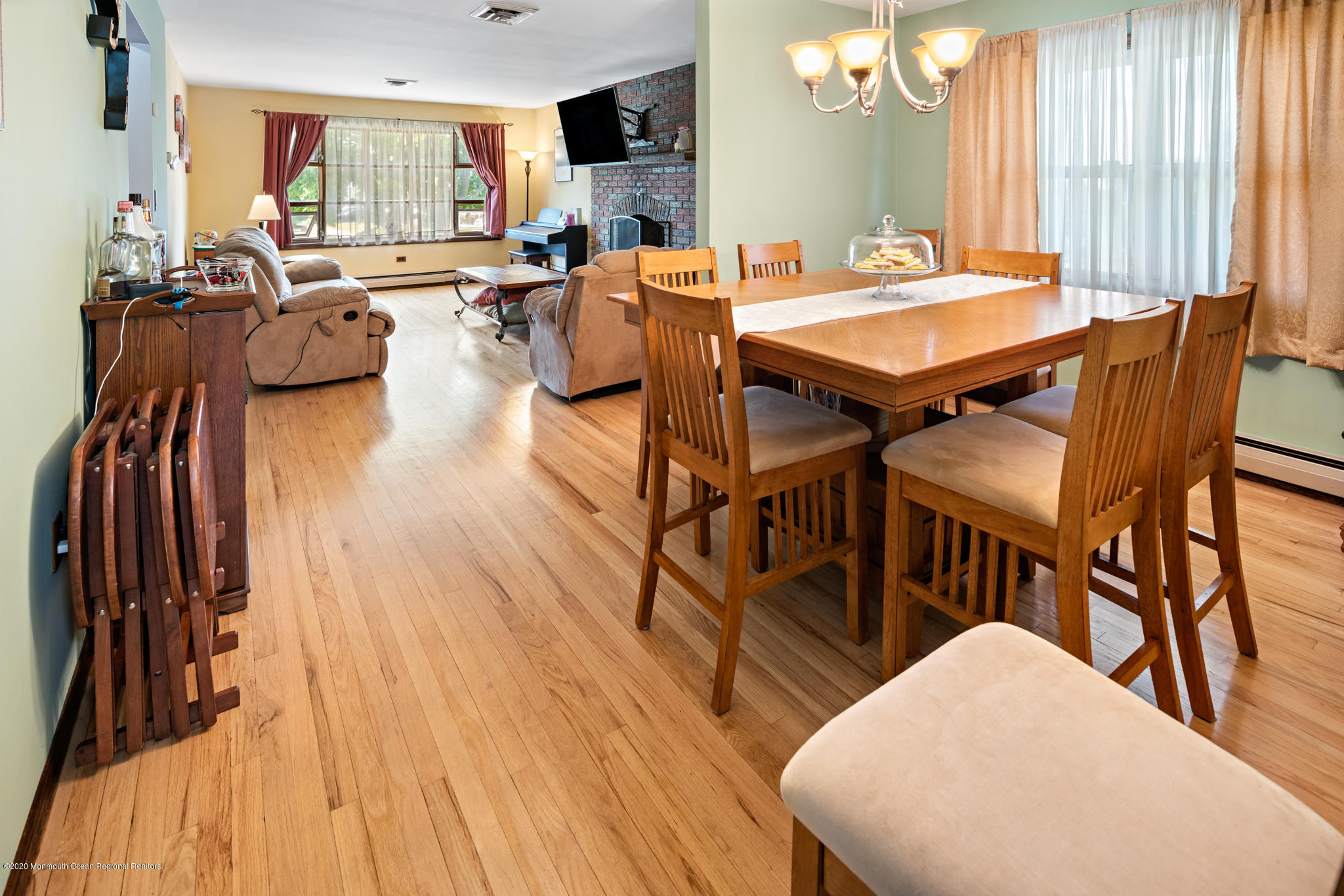 71 Broadway Keyport, NJ 07735 - Photo 14 of 27 a view of a dining room with furniture and wooden floor