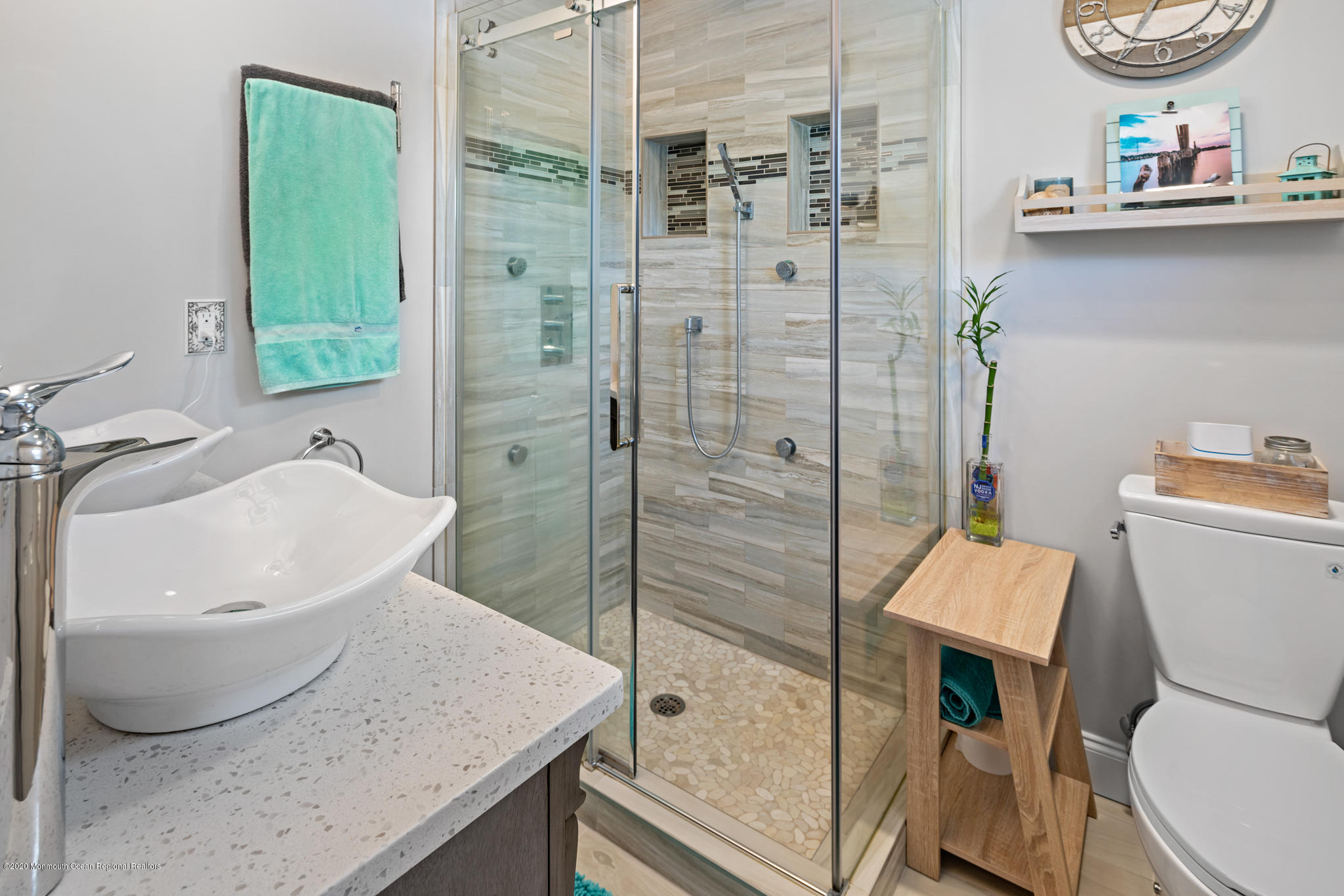 71 Broadway Keyport, NJ 07735 - Photo 19 of 27 a bathroom with a sink a toilet and shower