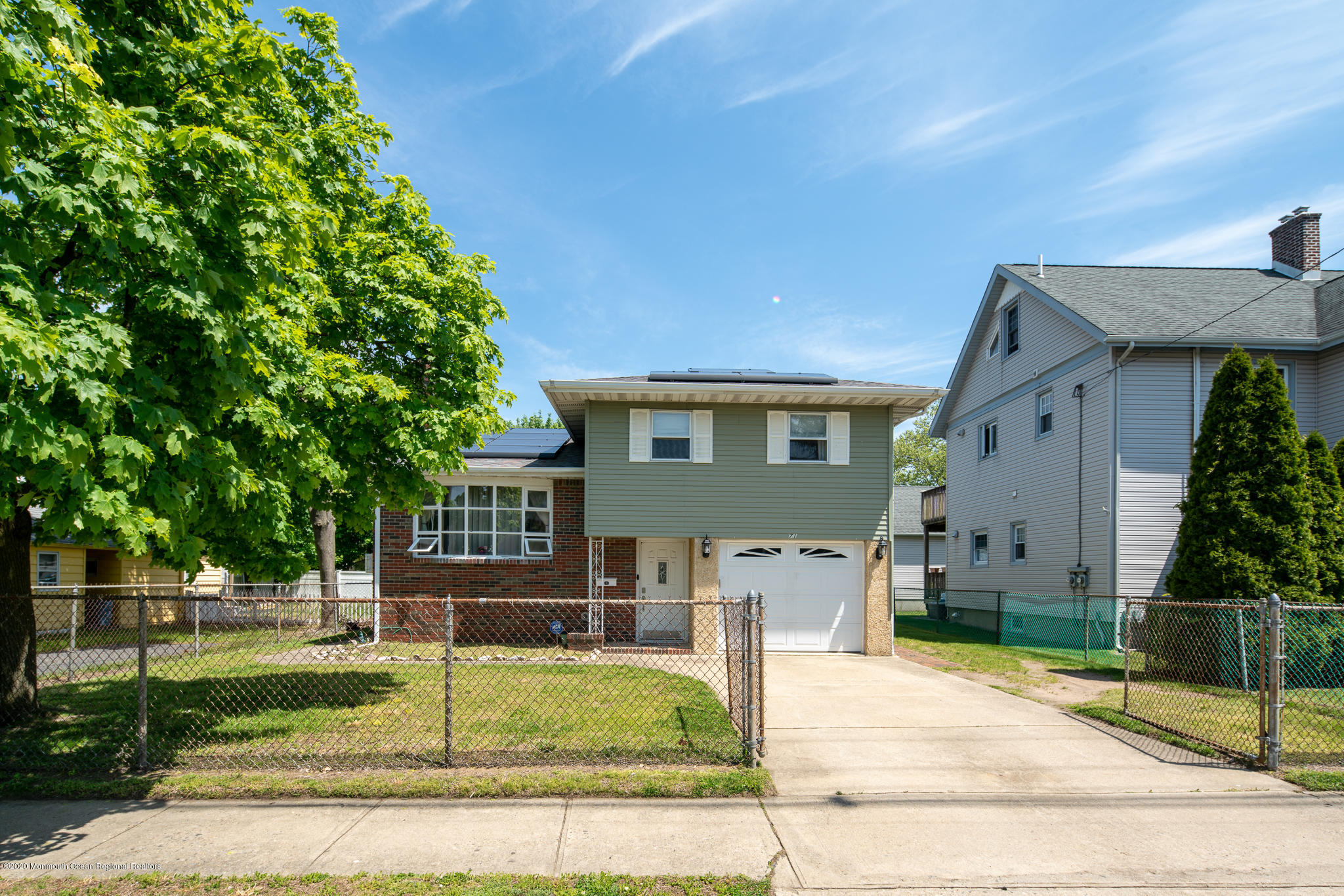 71 Broadway Keyport, NJ 07735 - Photo 2 of 27 front view of house with a yard