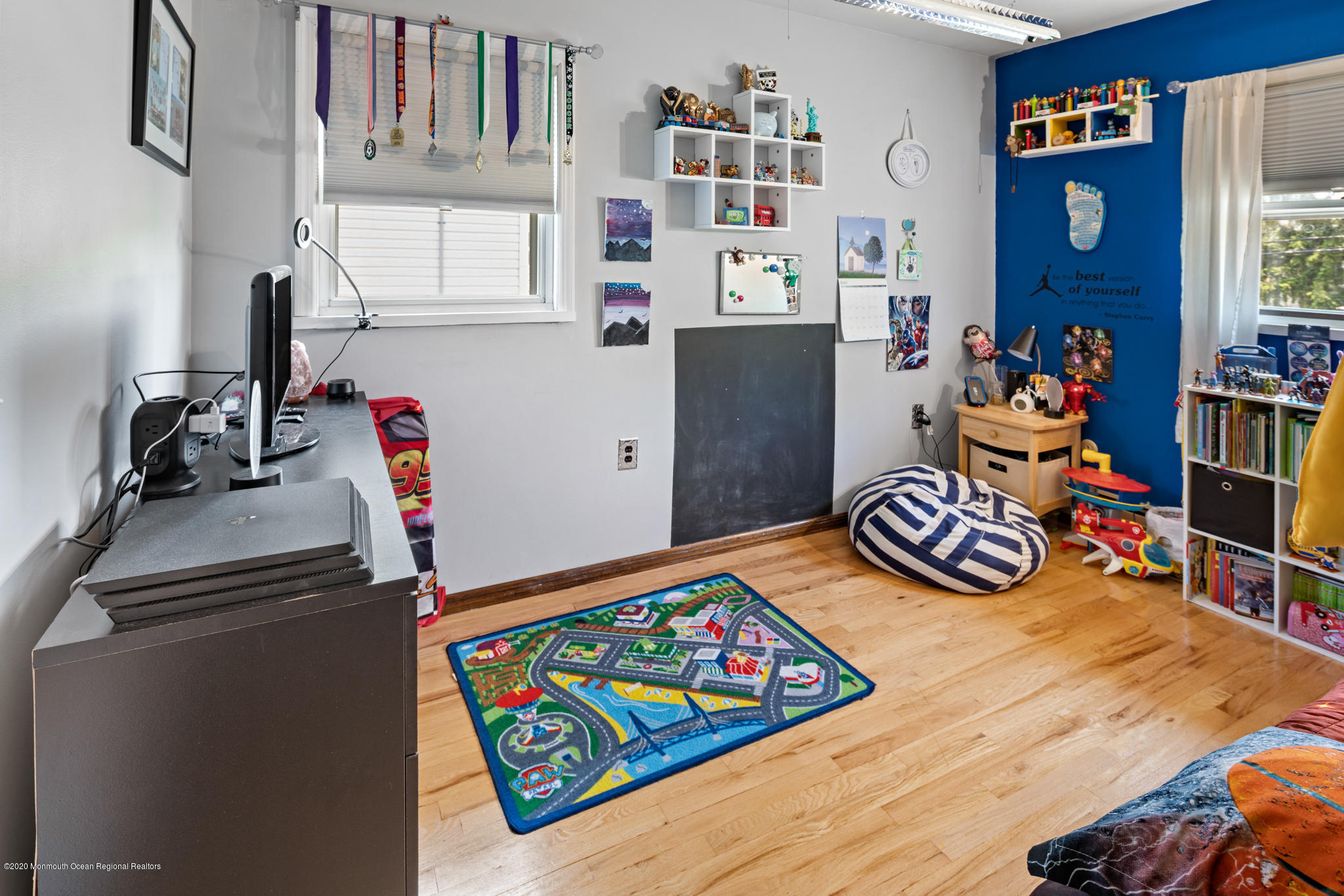 71 Broadway Keyport, NJ 07735 - Photo 21 of 27 a room with furniture and a book shelf