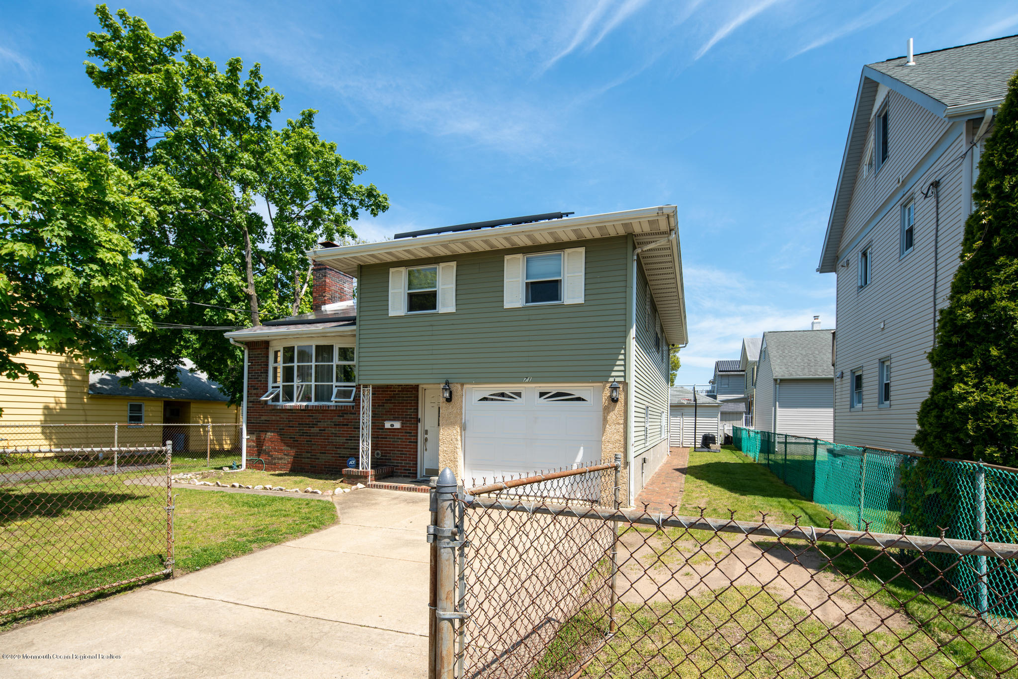 71 Broadway Keyport, NJ 07735 - Photo 3 of 27 a front view of a house with a yard