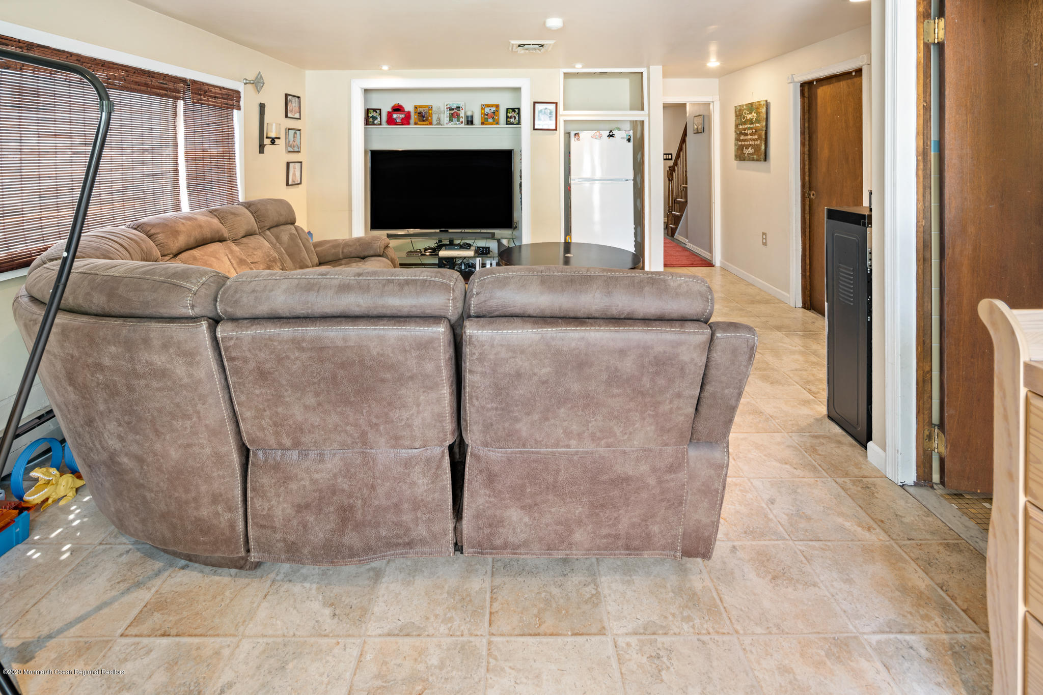 71 Broadway Keyport, NJ 07735 - Photo 7 of 27 a living room with furniture and a flat screen tv