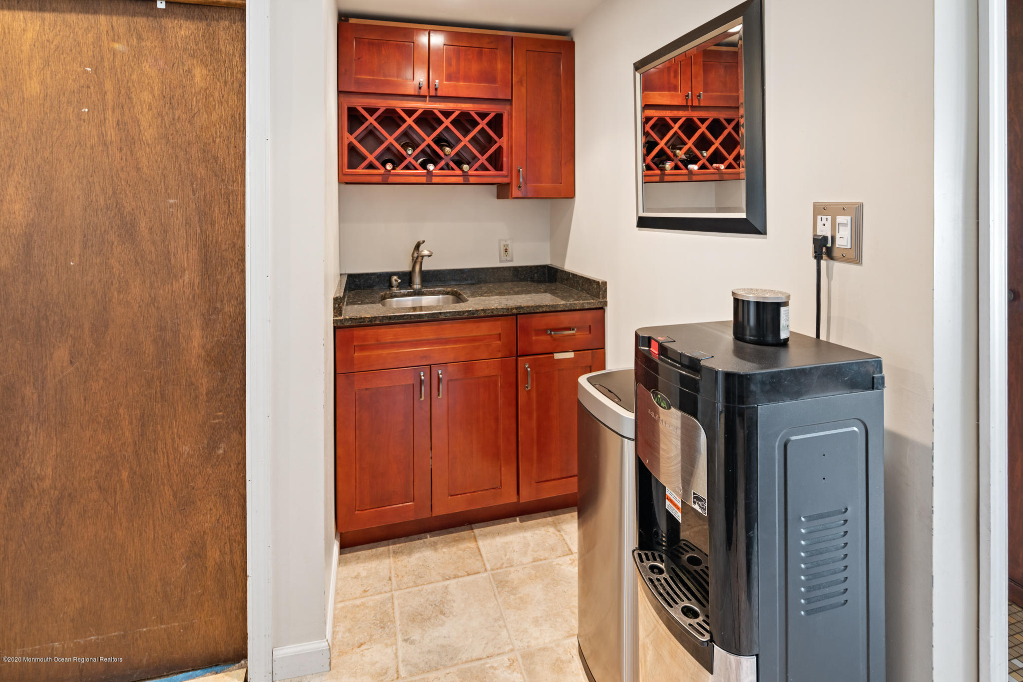 71 Broadway Keyport, NJ 07735 - Photo 8 of 27 a view of a kitchen with stainless steel appliances granite countertop a stove and a refrigerator