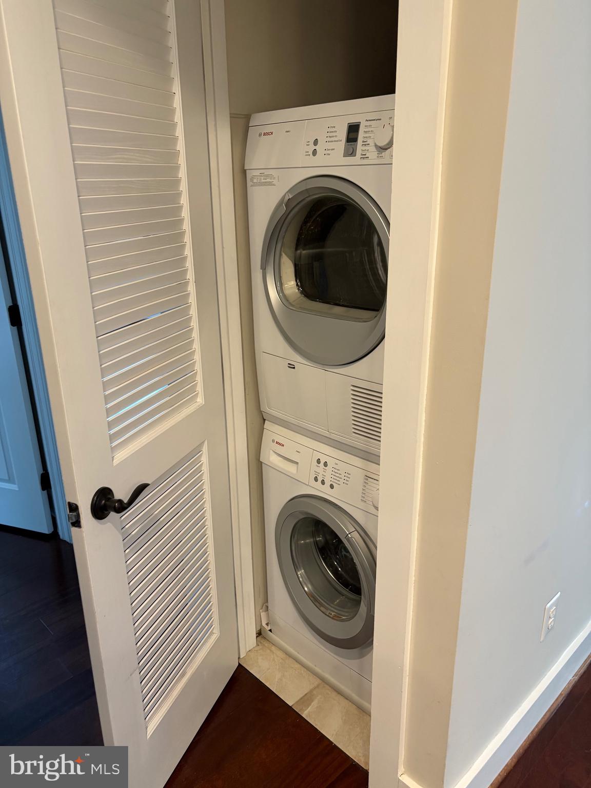 4004 Edmunds Street Northwest, Unit 7 Washington, DC 20007 - Photo 9 of 12 a utility room with dryer and washer