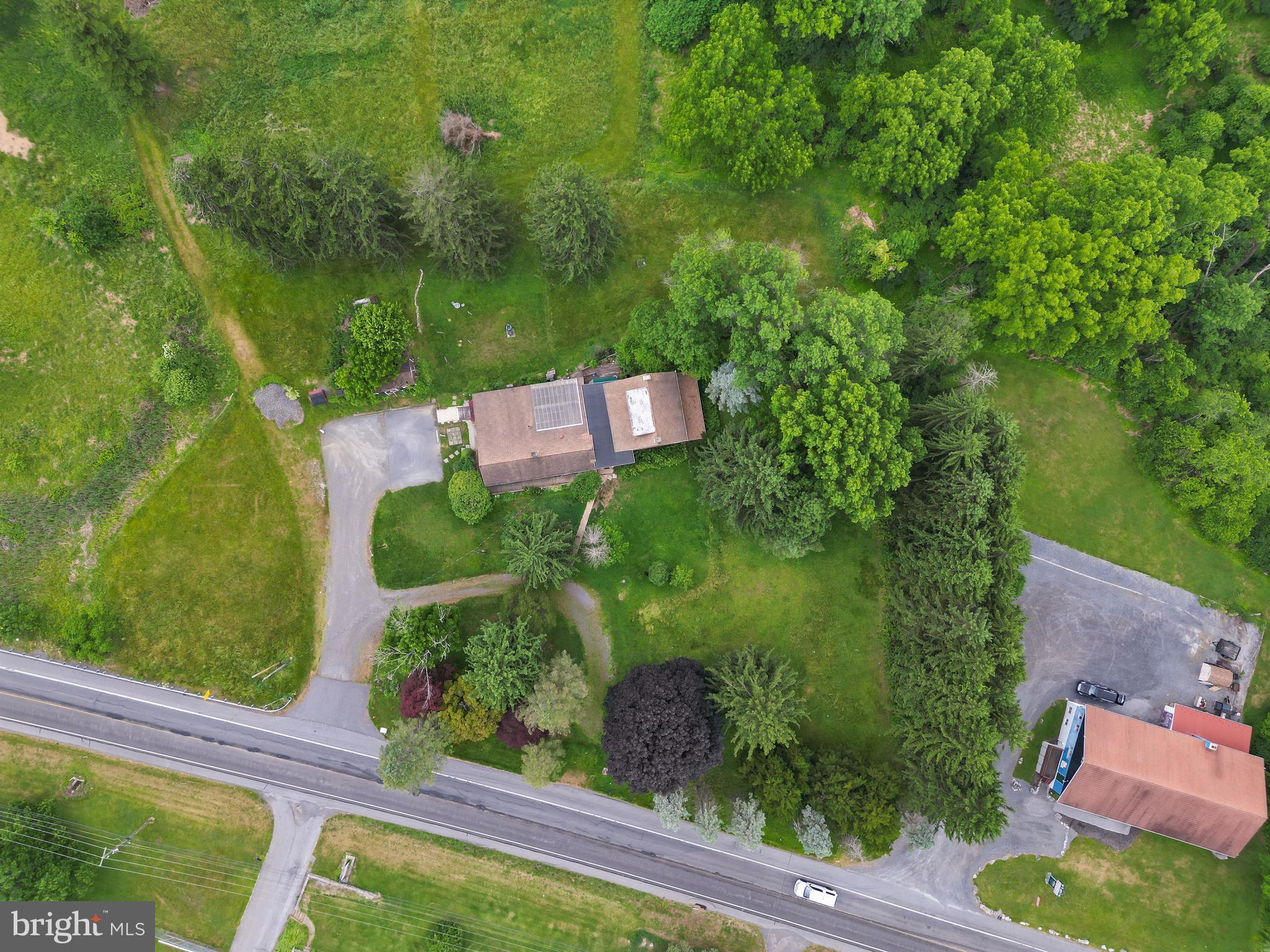 564 Blandon Road Fleetwood, PA 19522 - Photo 42 of 45 an aerial view of residential house with outdoor space and trees all around