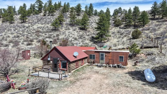 an aerial view of a house having yard