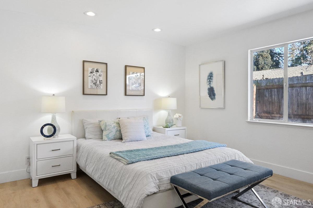 2531 Jerilynn Drive Concord, CA 94519 - Photo 19 of 34 a bedroom with a bed and a table