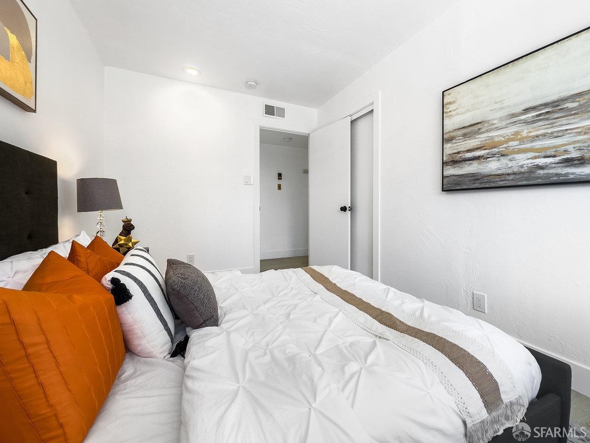 2531 Jerilynn Drive Concord, CA 94519 - Photo 24 of 34 a bedroom with a bed and painting on the wall