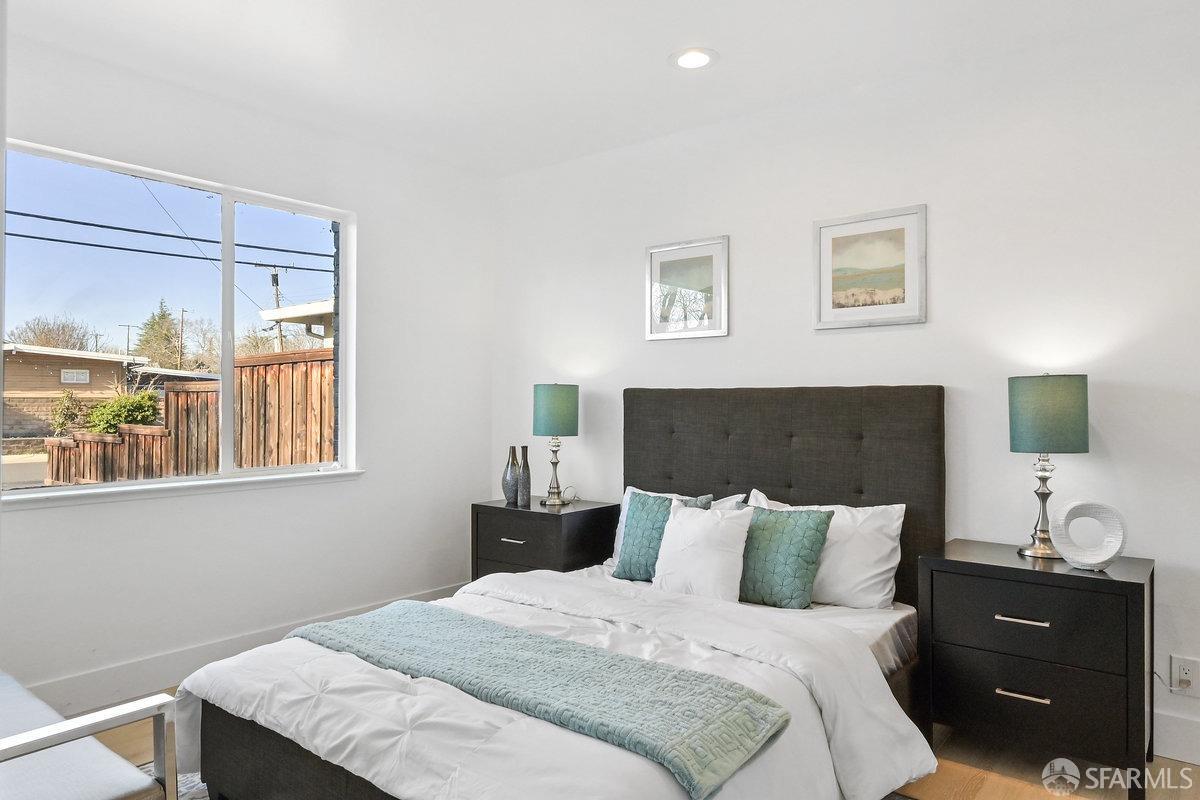 2531 Jerilynn Drive Concord, CA 94519 - Photo 25 of 34 a bedroom with a bed and a lamp