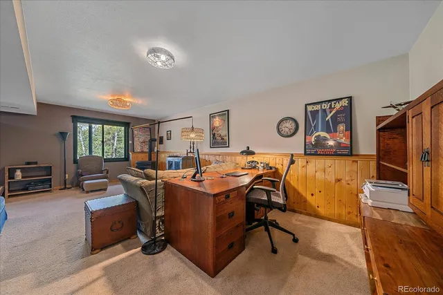 a view of a livingroom with furniture and window