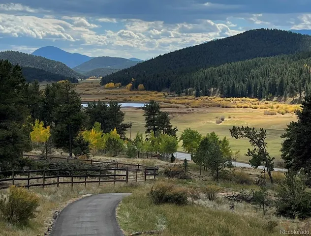 a view of lake with mountain