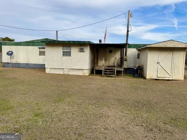 a house view with a outdoor space