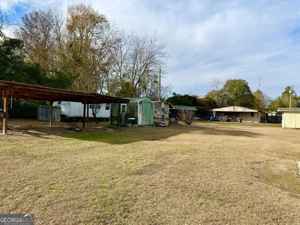 a view of house with outdoor space
