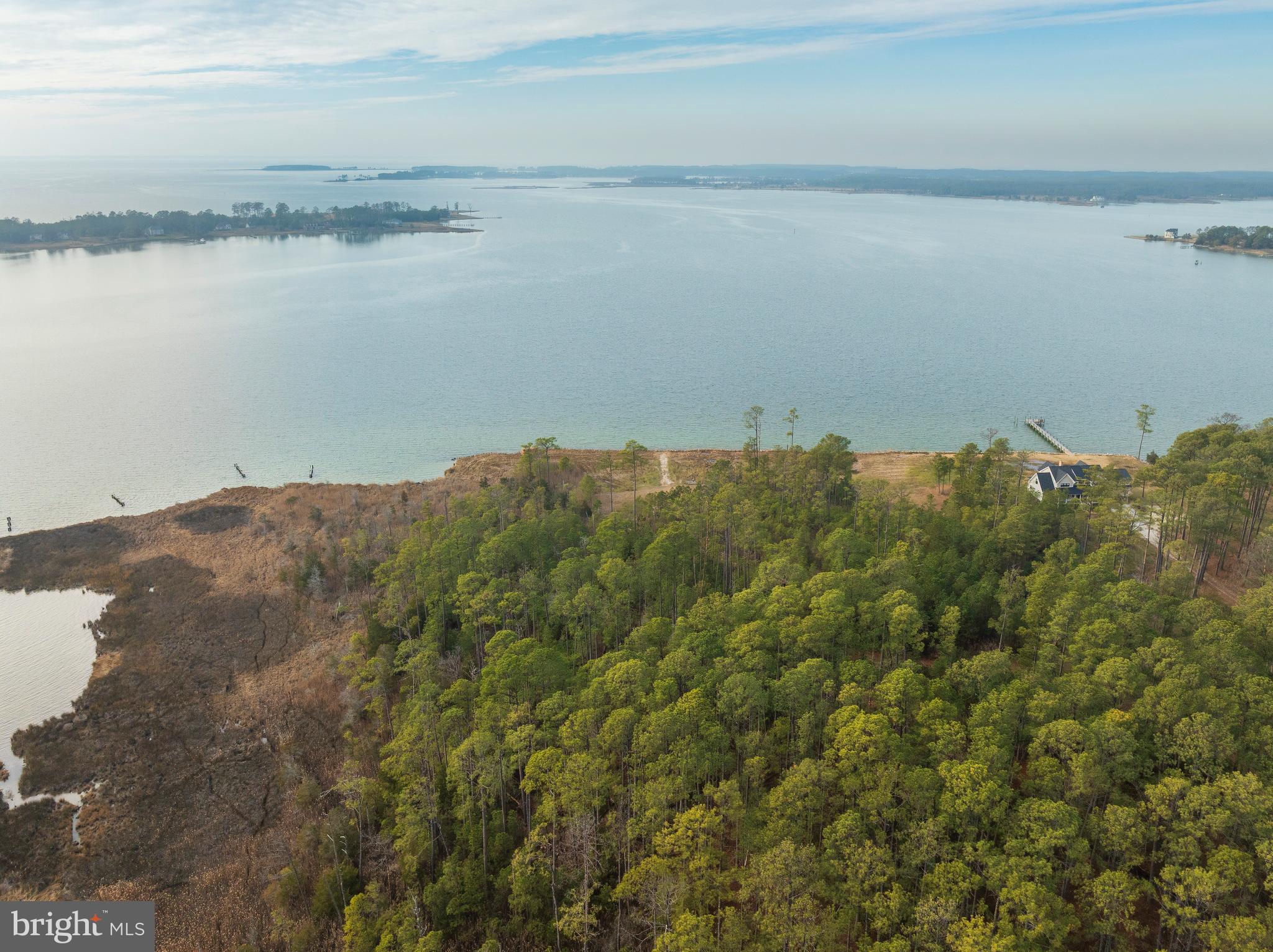 5200 Travelers Rest Road Cambridge, MD 21613 - Photo 14 of 27 a view of a lake with a mountain in the background